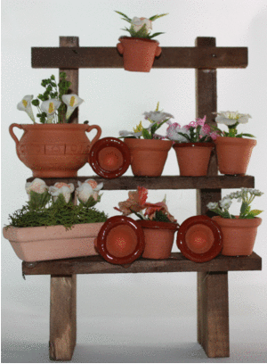 MESA CON  FLORES 3 ALTURAS 18*12 CM